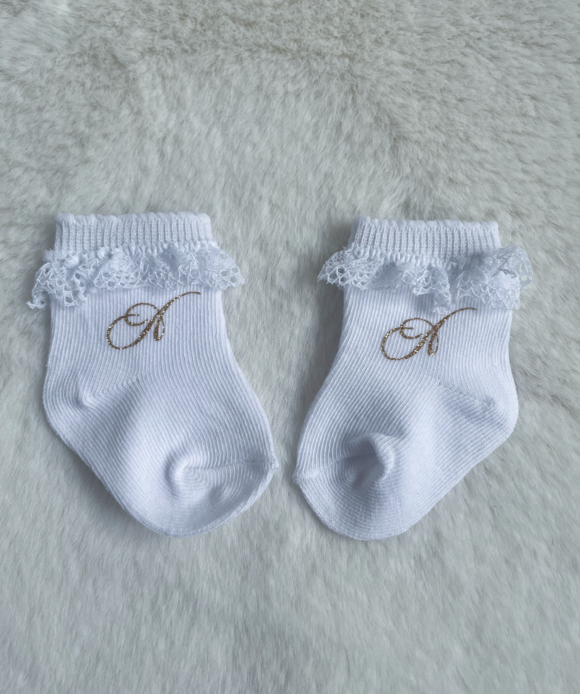 Chaussettes bébé blanches avec dentelle