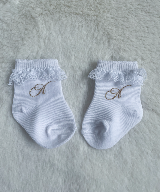 Chaussettes bébé blanches avec dentelle